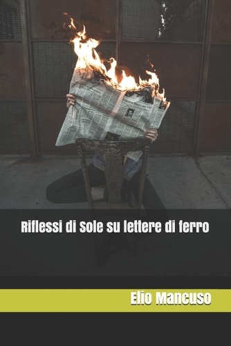 Riflessi di Sole su lettere di ferro