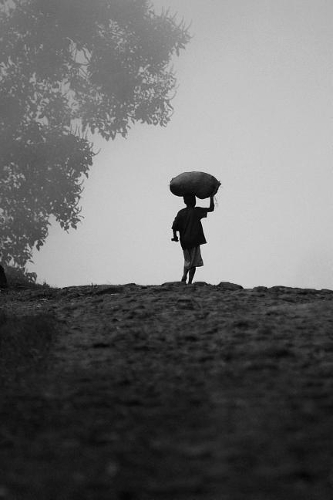 Carrying Rice in Uganda, Africa Journal