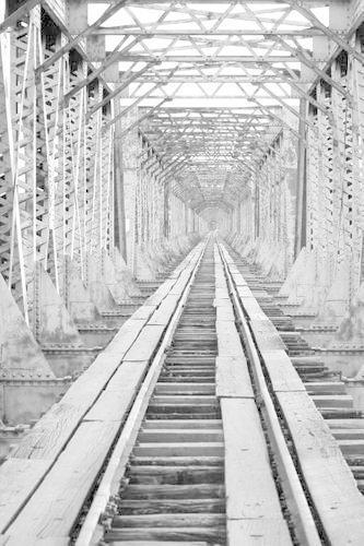 Steel Tracks and a Steel Train Locomotive Bridge